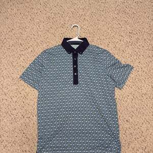 Greyson Men's Blue Geometric Golf Performance Polo Shirt